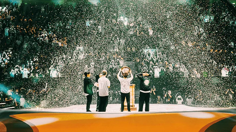 Team Spirit lift the Aegis after winning The International 2026